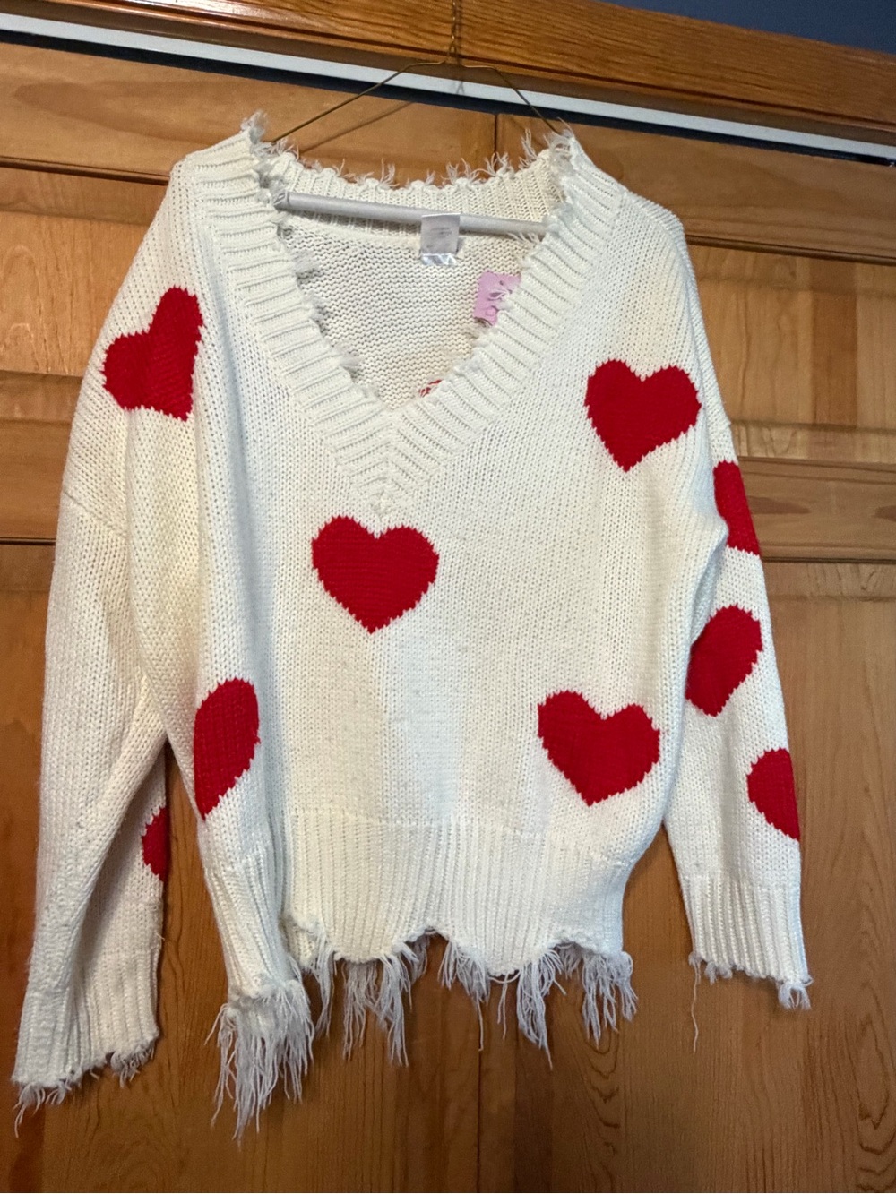 Main Strip Cream V-Neck Sweater with Red Heart Accents